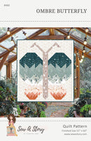 Ombre Butterfly quilt pattern cover with a teal-to-terracotta gradient butterfly