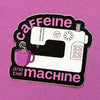 Caffeine & the Machine sticker with a sewing machine, purple coffee mug, and pink lettering