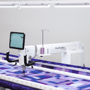Handi Quilter Infinity 28 with Pro-Stitcher on Gallery 3 Lift Frame - Fabric Bash