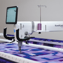 Handi Quilter Infinity 28 with Pro-Stitcher on Gallery 3 Lift Frame